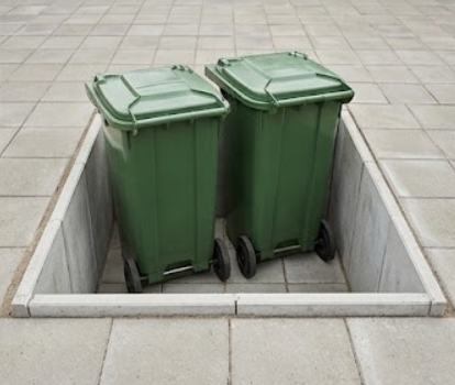 Lav et fors�nket skraldespandsomr�de